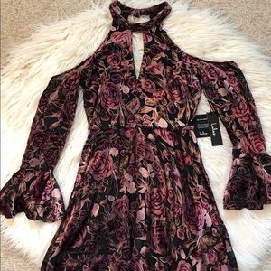 Crushed velvet cold shoulder fit and flare dress.